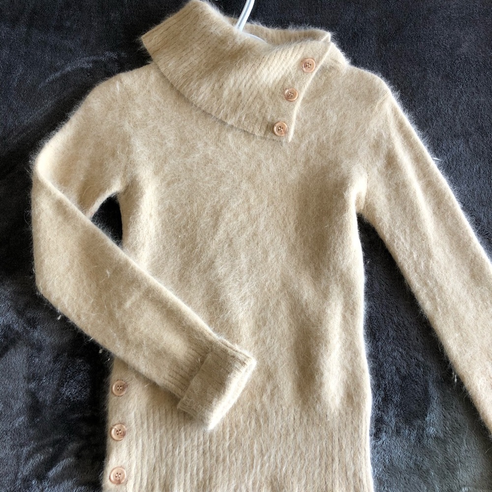 Folding Beige Fuzzy Turtleneck Sweater